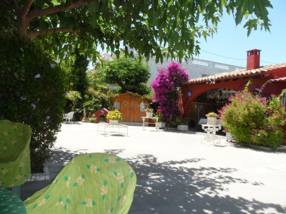 Casa con jardín frente Playa de Burriana Vila Exterior foto